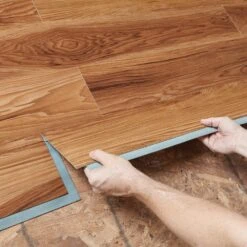 TrafficMaster High Point Chestnut 6 In. W X 36 In. L Luxury Vinyl Plank Flooring (24 Sq. Ft. / Case) -FloorZone Savings 636503a2e96e5c3683353b87b6ba2a0b 1800x1800